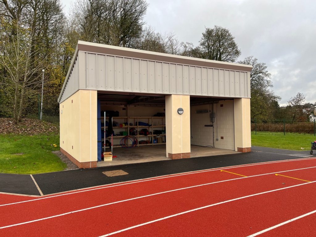 Wire fence with shipping container