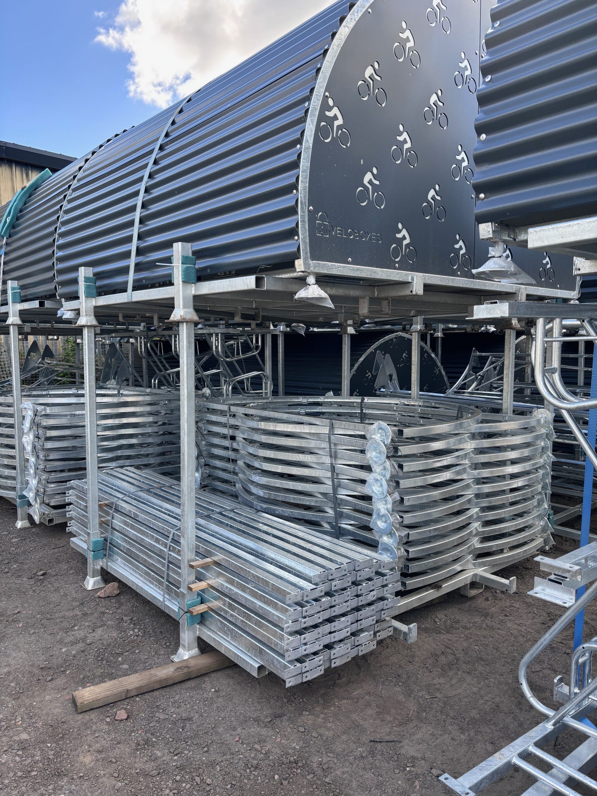 Stacked metal frames and containers