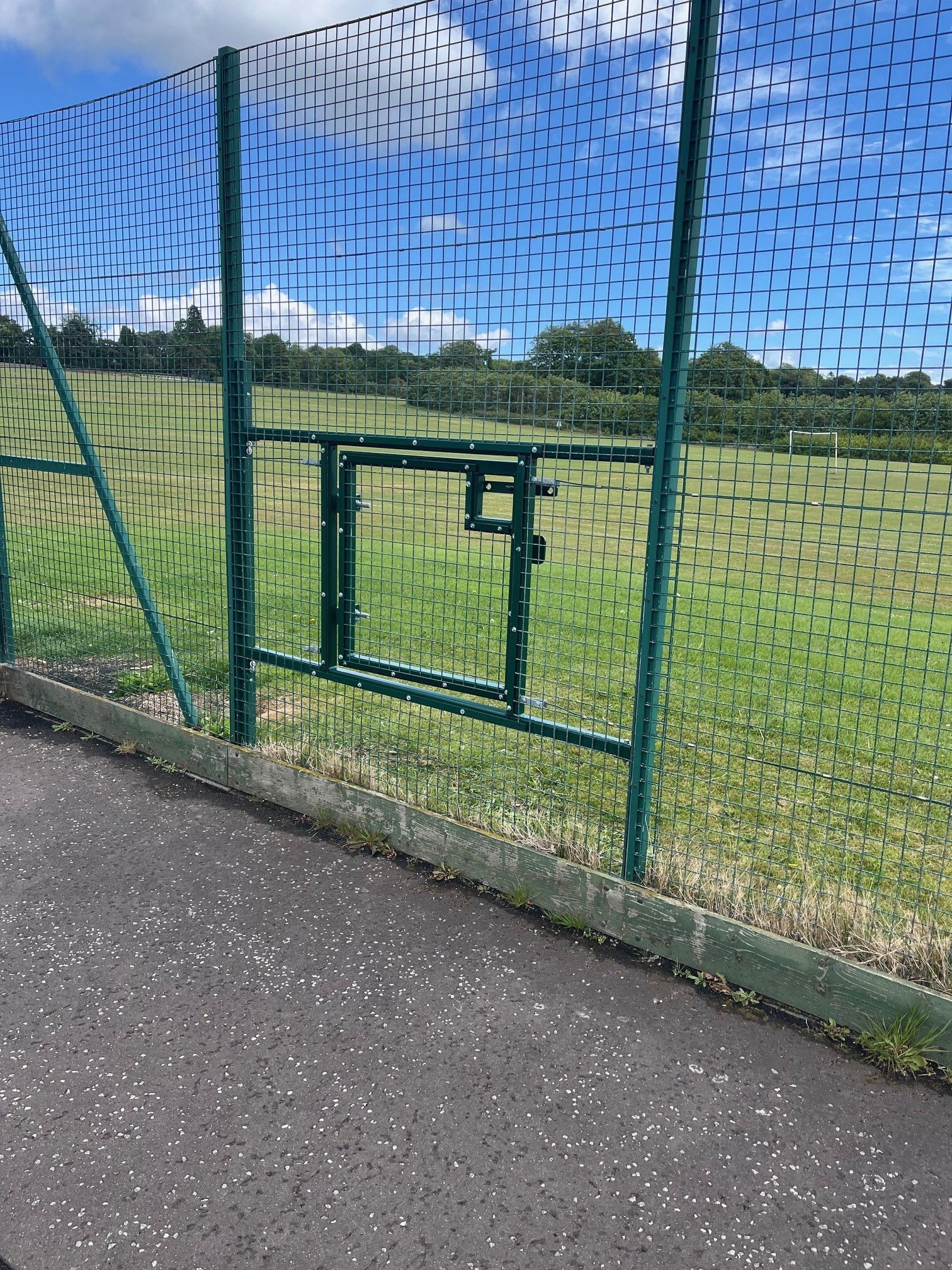 A modern deck with glass railings