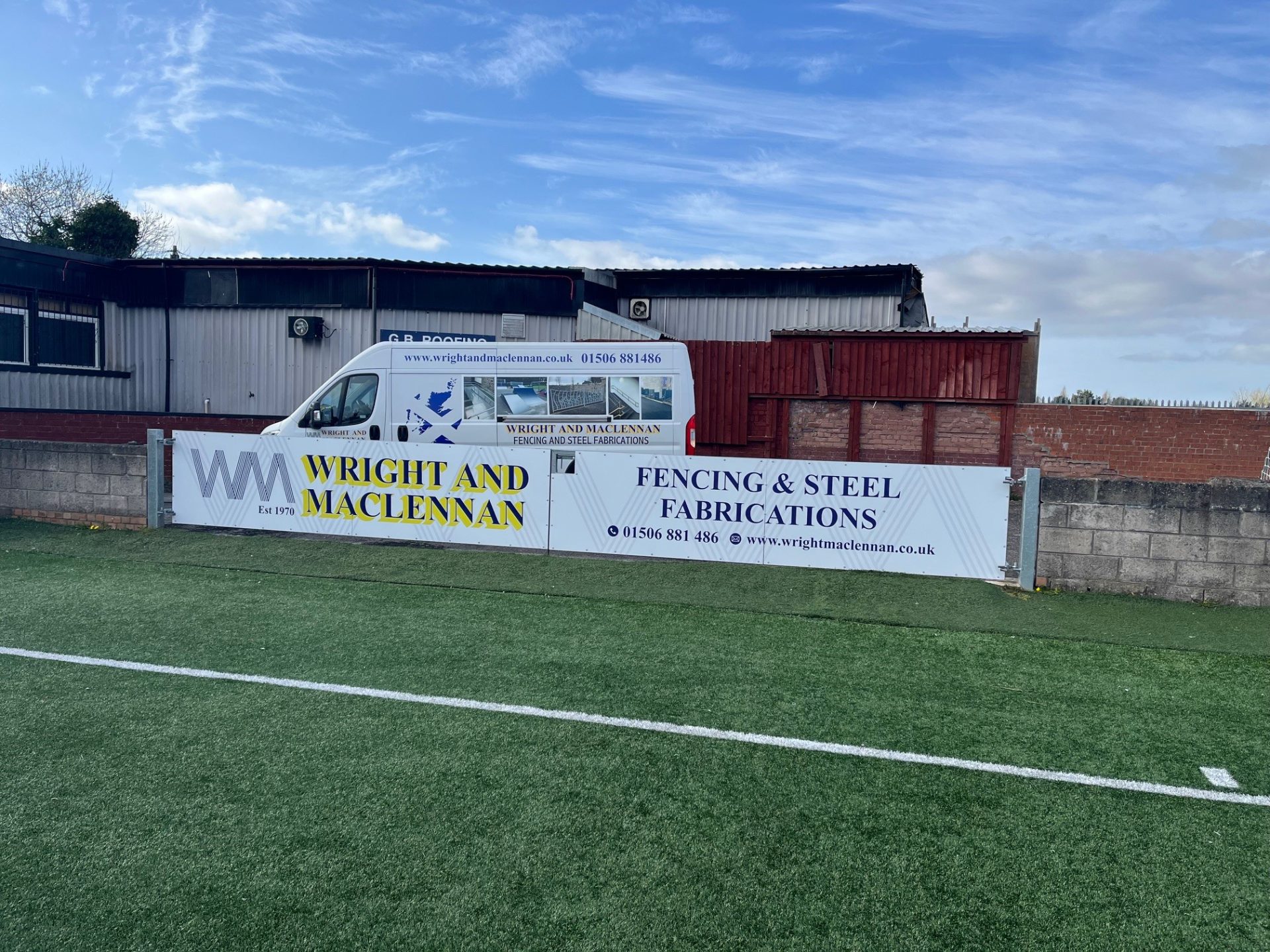 A ground with green grass