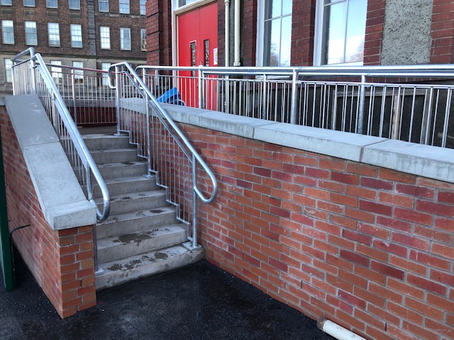 Brick ramp with metal railing