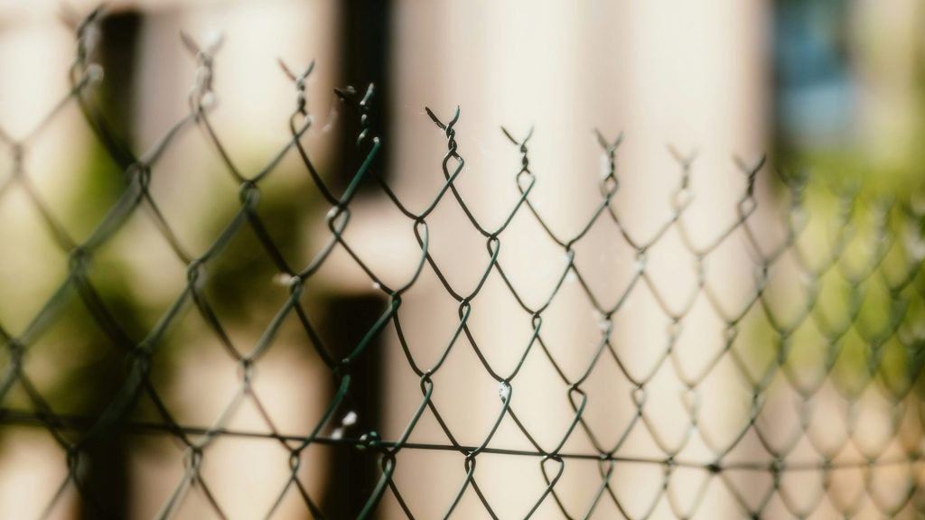 a close up of a chain link fence